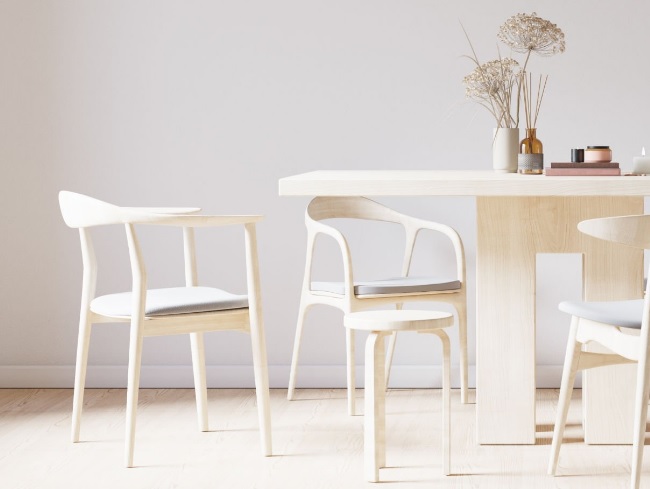 W jaki sposób wykończenie blatu wpływa na trwałość stołów?